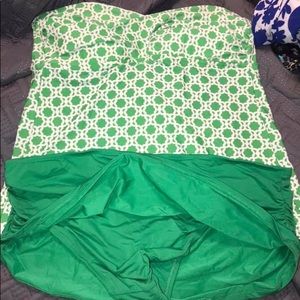 Strapless tankini with skirt bottoms.